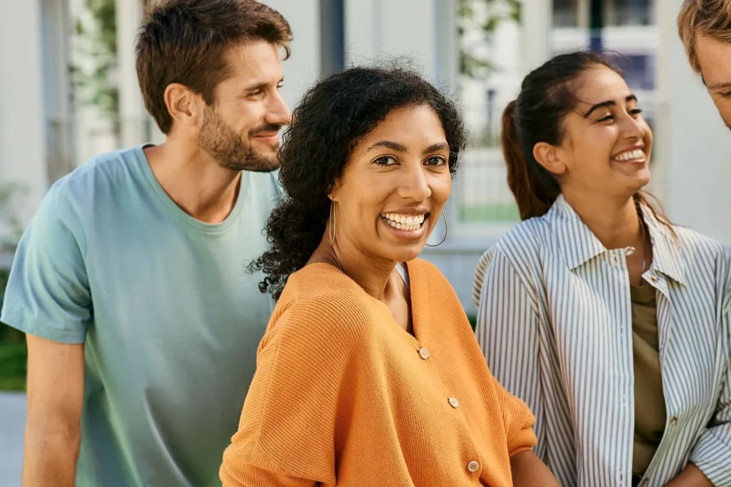 Roland Berger professionals collaborating in a modern office environment, representing women in leadership, consulting careers, and professional growth.